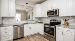 Affordable kitchen remodel near me with white cabinets and modern backsplash