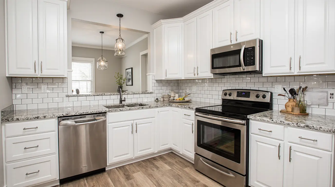 Affordable kitchen remodel near me with white cabinets and modern backsplash