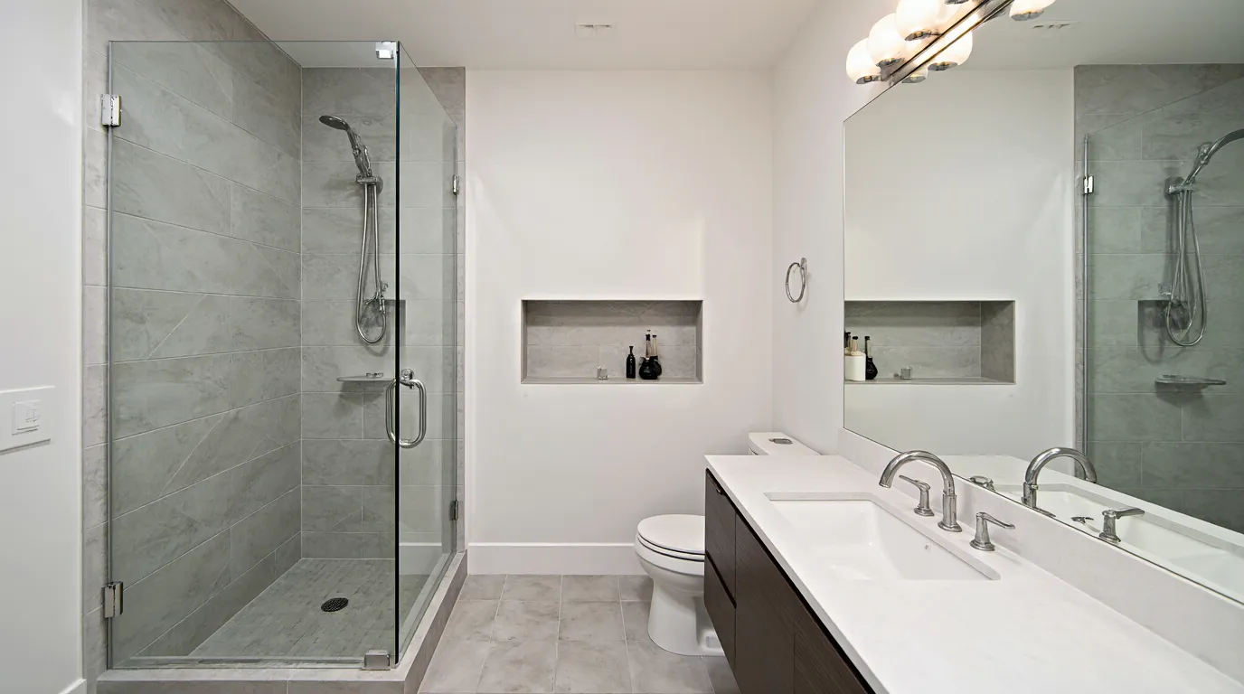 Small bathroom remodel MA project with floating vanity and glass shower by EBM Construction.